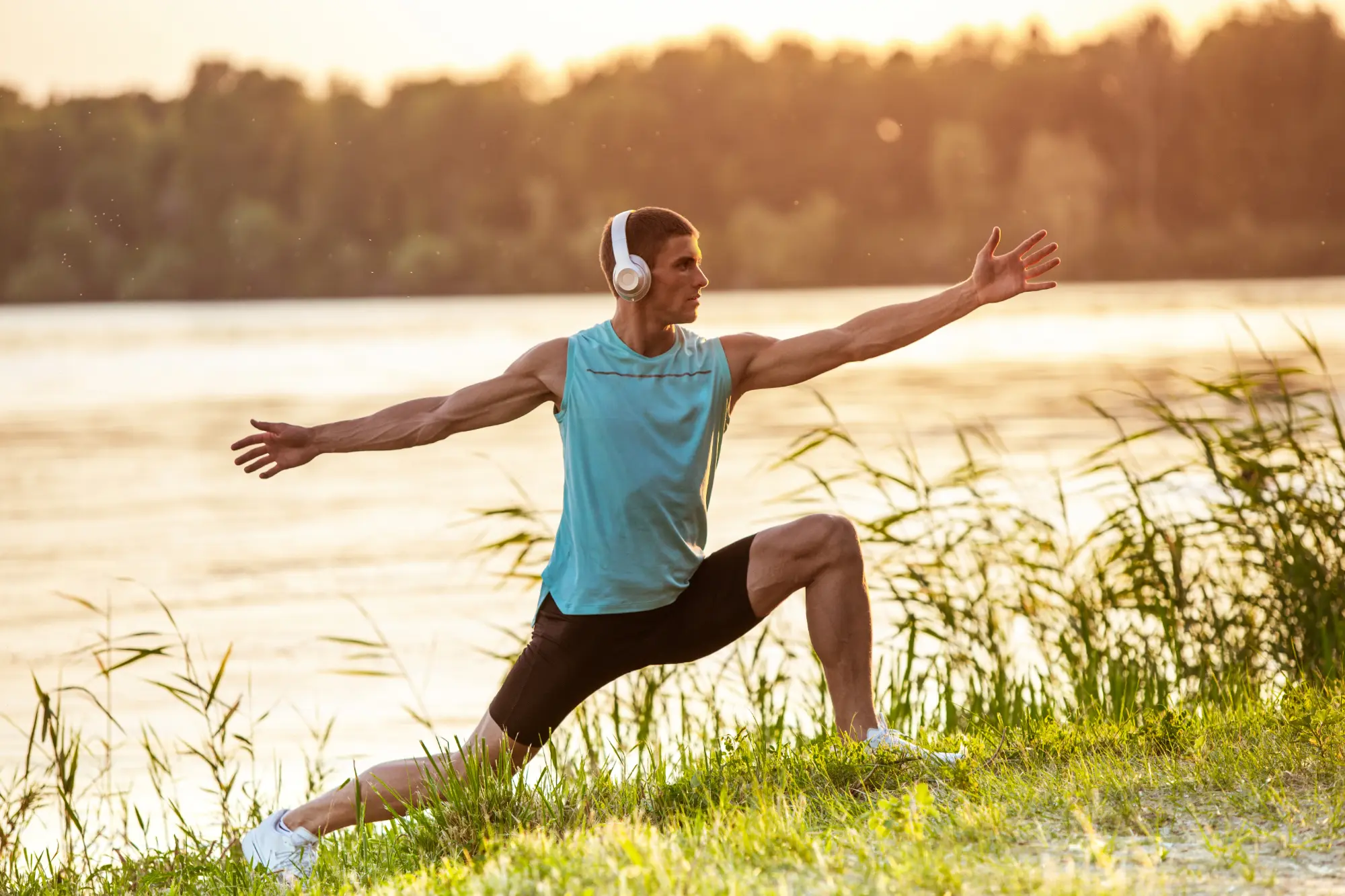 Man stretching at sunset by a lake - Brotox treatment zones for men